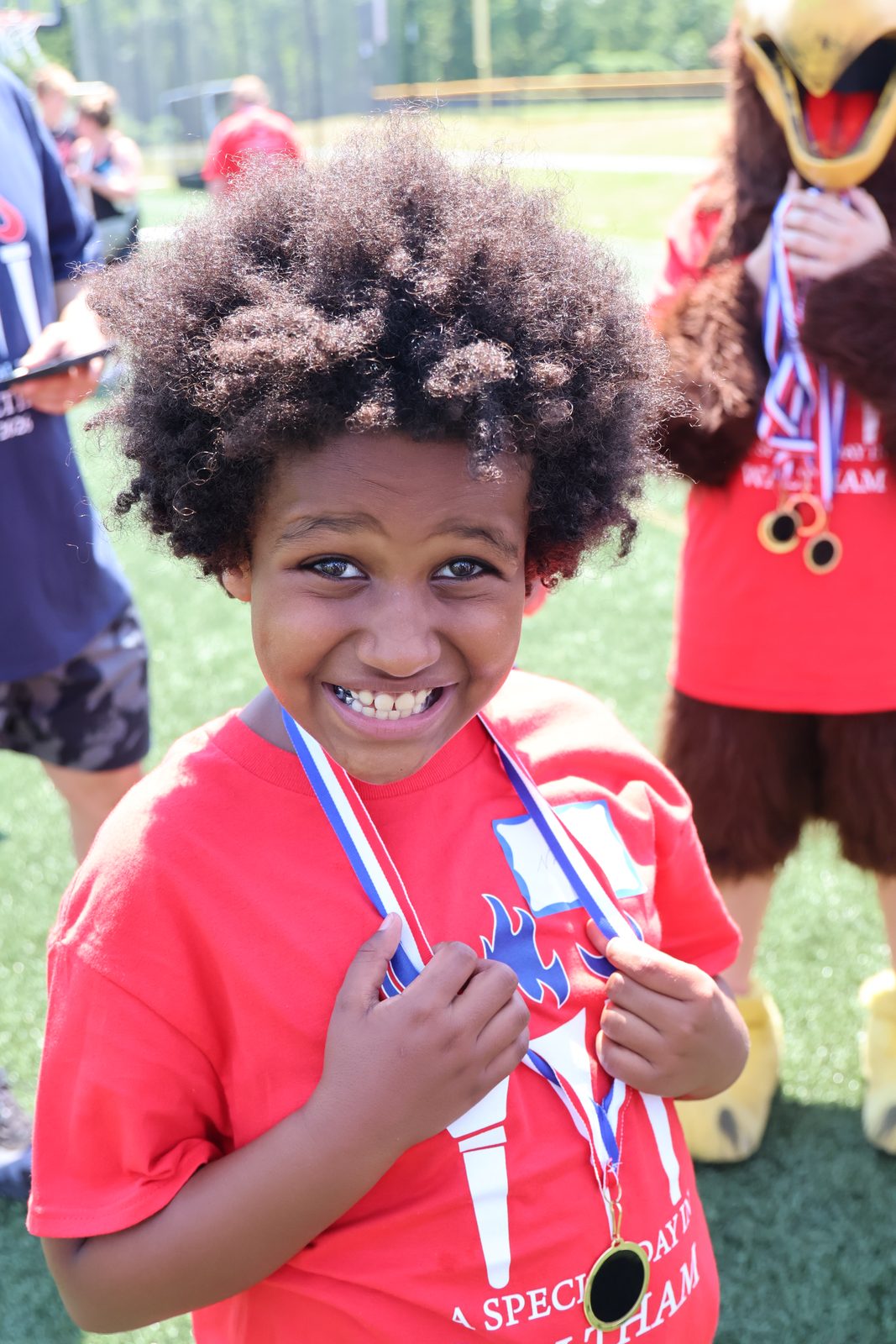 Young athlete with medal