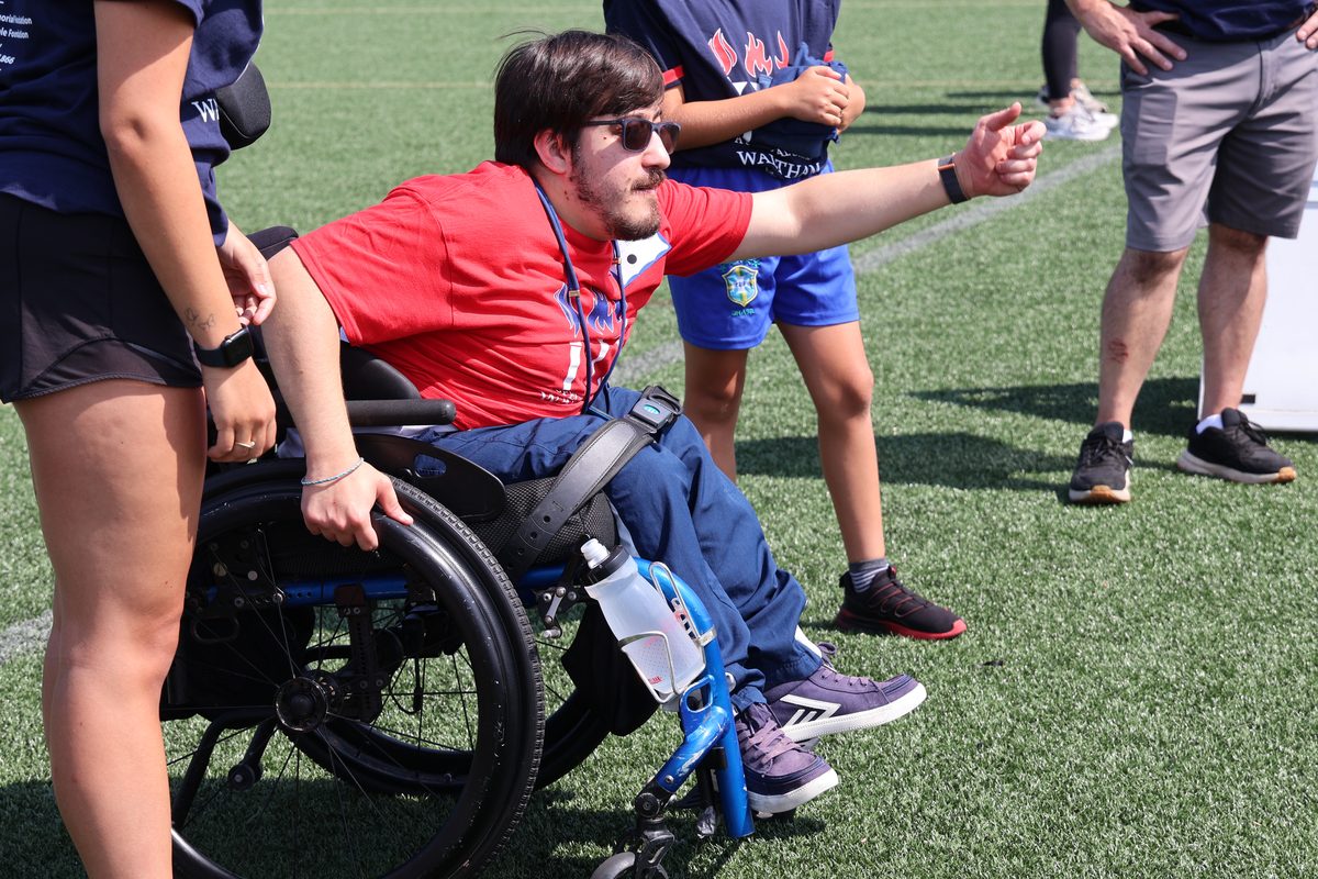An athlete cheering at A Special Day in Waltham 2026