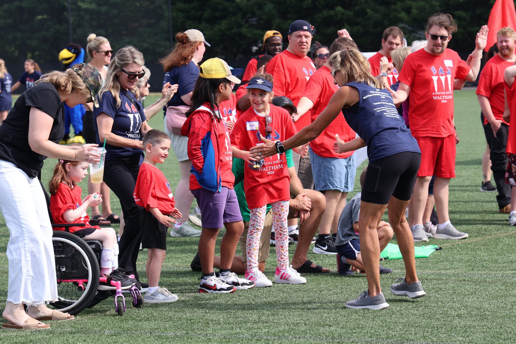 Athletes and volunteers celebrating at A Special Day in Waltham 2026